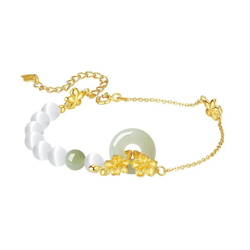Pure silver peach blossom and safety buckle bracelet for women in New Chinese style, shown in electroplated gold tone.
