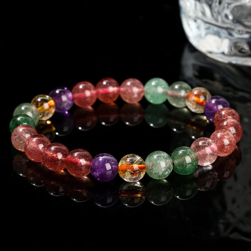 Natural strawberry quartz bracelet with round beads in 7mm, 8mm, or 9mm sizes.