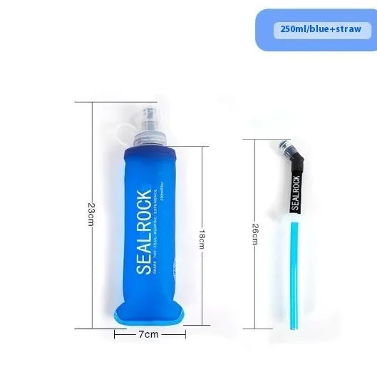 Mountain Cliking portable plastic straw with black clip attached to a green backpack strap