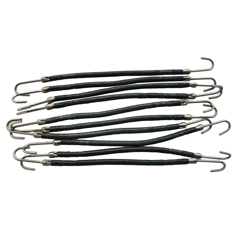 Close-up of a solid colour double hook hair tool for securing wigs and hair wefts.