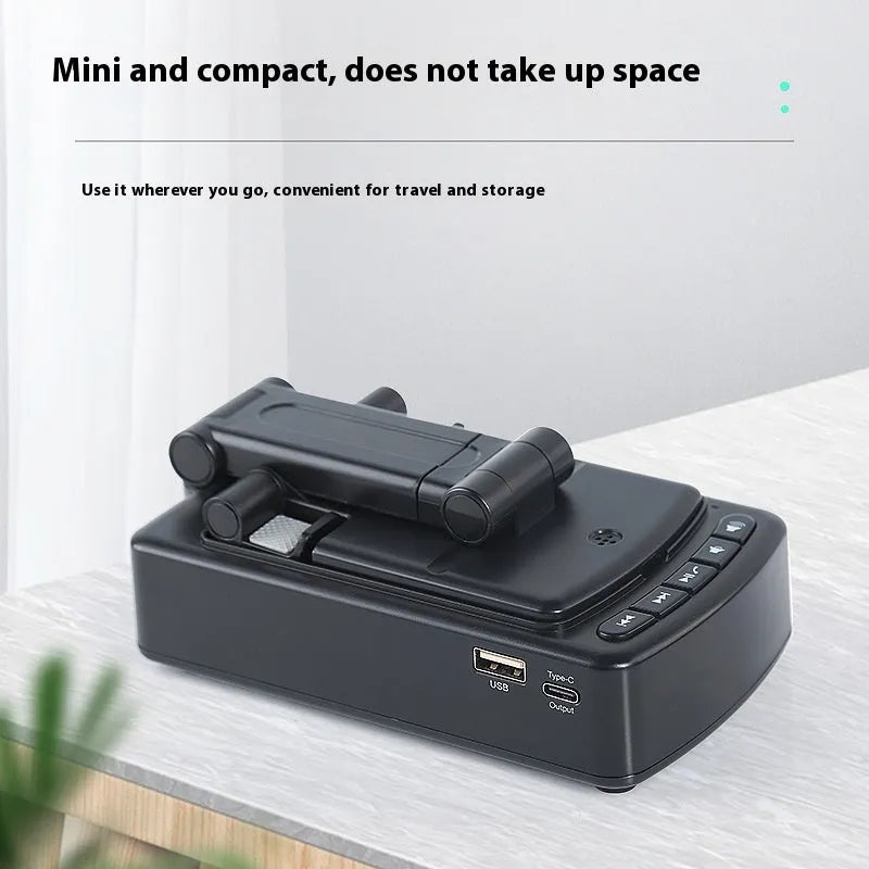 Multifunctional plastic tablet and phone holder in black with Bluetooth-compatible audio