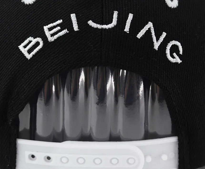 Adjustable cotton baseball cap with dome crown in Black or White