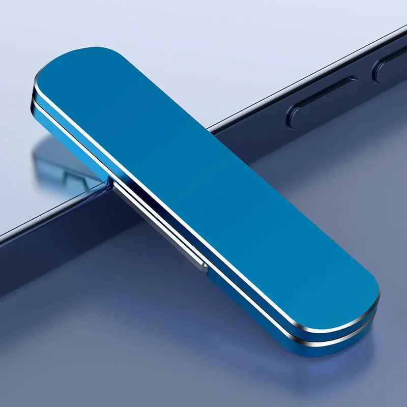 Foldable aluminium phone holder in silver, 55x14x4.5mm, with 360° rotation and 180° extension.