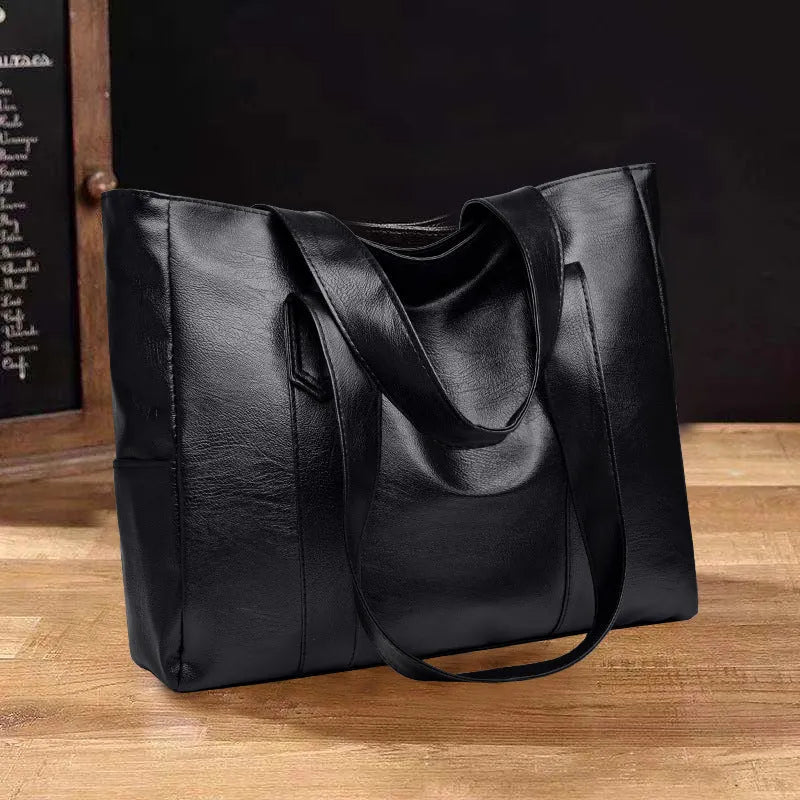 Medium-hard PU leather tote handbag in horizontal square shape with sewing thread detail and double shoulder strap