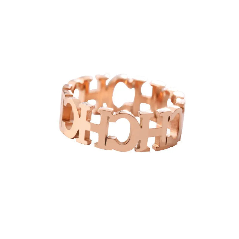 Gold titanium steel unisex letter ring with hollowed cut design, sizes 6 to 9
