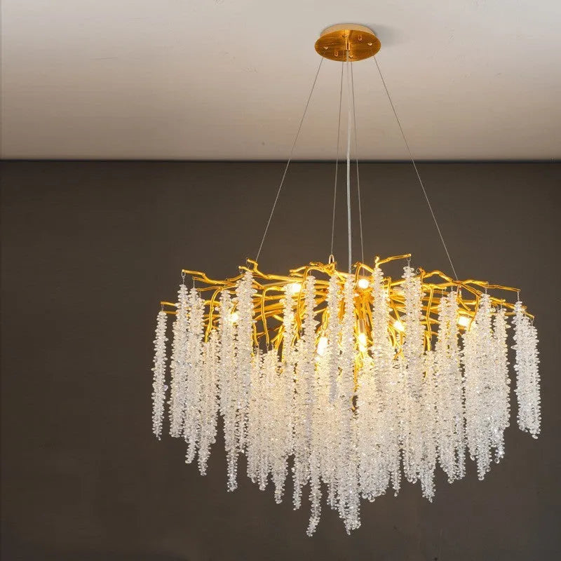 Modern crystal chandelier with adjustable chain and LED lights in a light luxury style.