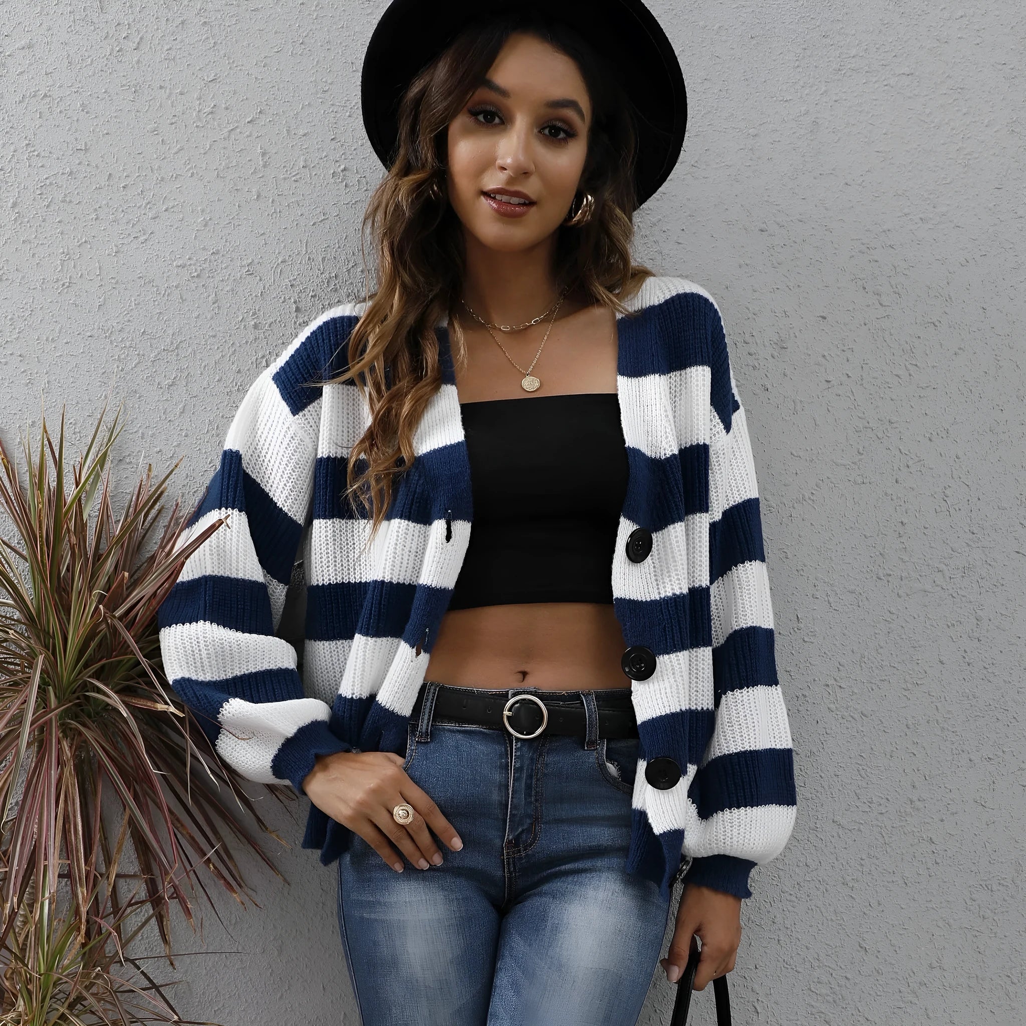 Blue striped women's cardigan sweater with button front and deer plush texture.