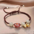 Women's Hetian jade bracelet with peace buckle charm, constellation detailing, and adjustable shihuan closures