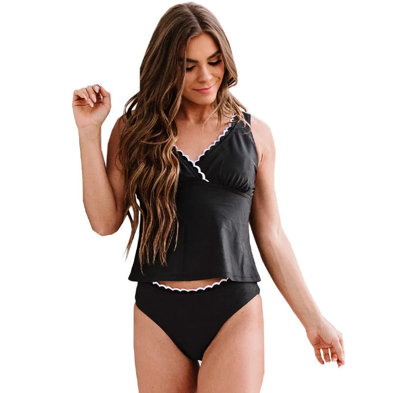 Black women's split swimsuit made from nylon fabric with sleeveless design