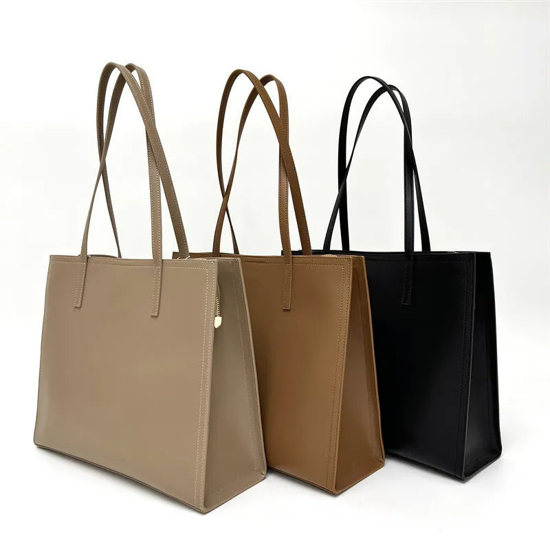 Women's brown genuine leather one shoulder handbag with multiple interior compartments