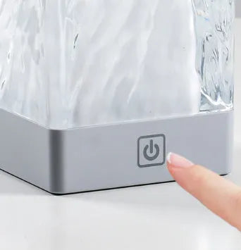 Mini crystal lamp with USB cable and touch control, plastic body, 80x80x12mm size on a desk
