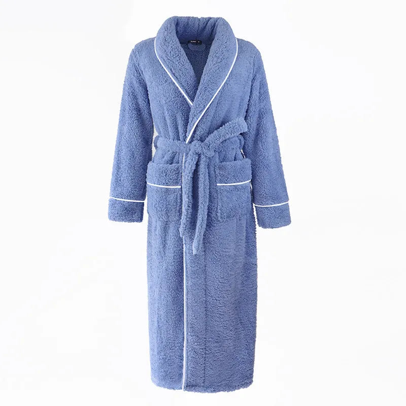 Man and woman wearing matching thick navy blue flannel bathrobes, showcasing the extended length and winter fabric.