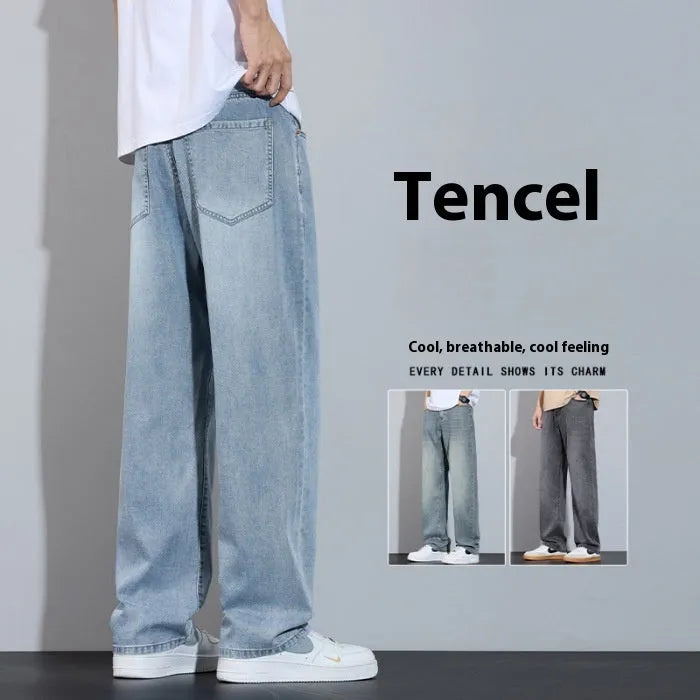 Straight leg denim trousers in a wide leg style on a hanger, showing the zip fly placket.