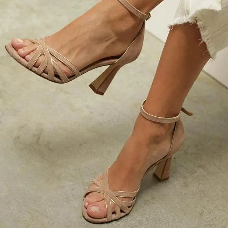 Apricot coloured women's sandals with suede upper and peep toe design on rubber sole