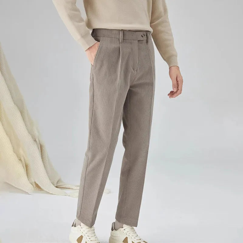 Men's straight-leg corduroy trousers in beige colour showing micro elastic waistband and loose fit design