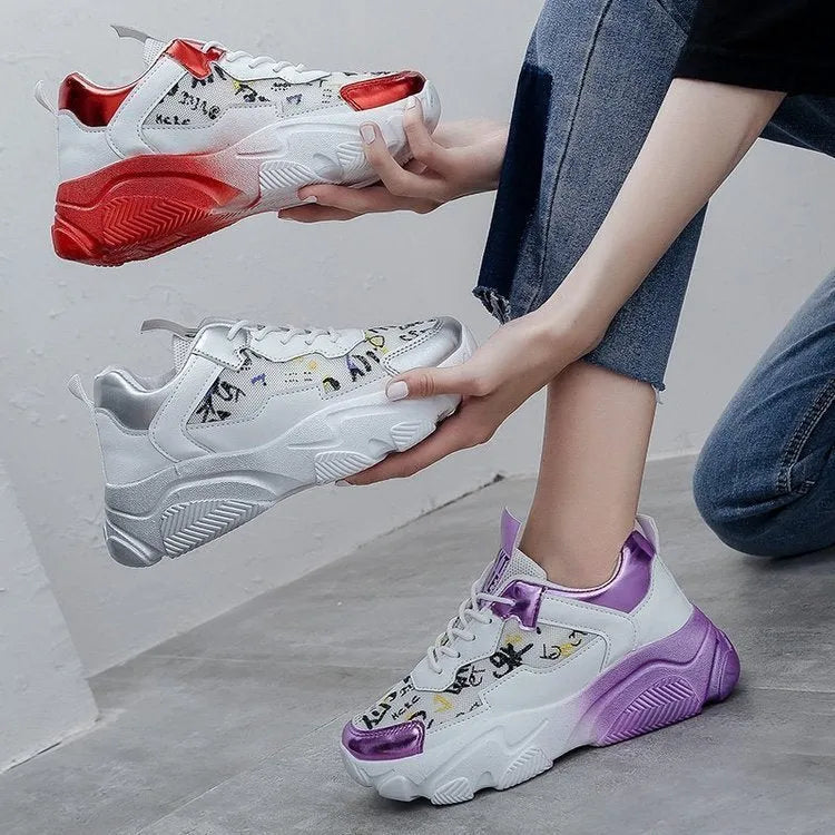 Breathable mesh light sole running shoes in red and silver, side view