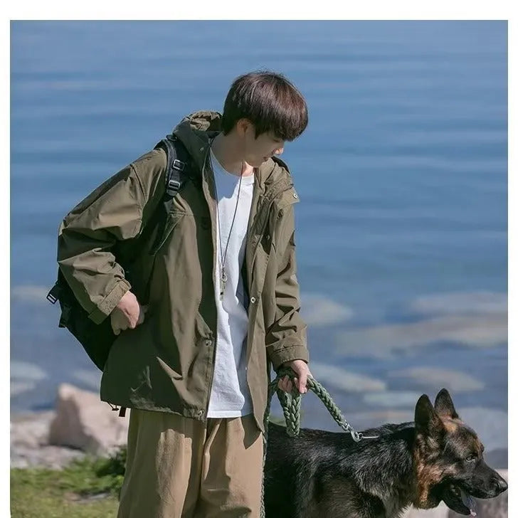 Men's windproof jacket in military green, loose fit, hooded, long sleeves, polyester, casual coat for autumn.