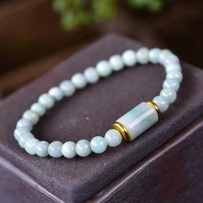 Myanmar jade bracelet with 8mm emerald colour round beads in geometric ethnic style design