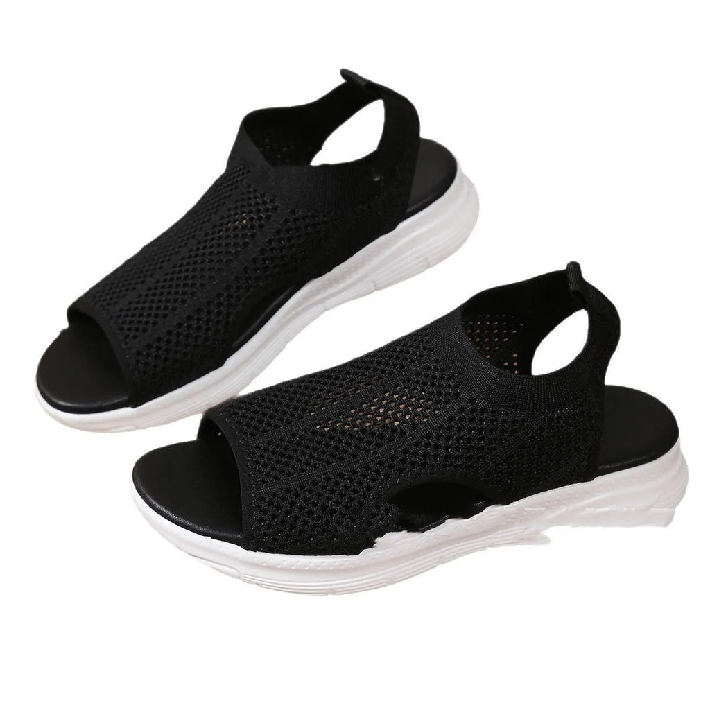 Women's platform sports sandals in black, white, or pink with rubber sole and mesh lining