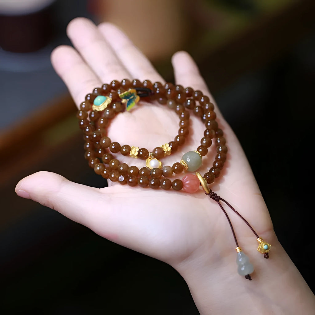 Brown jade Hetian jade three-ring bracelet with butterfly gourd pearl design and silver plated accessories