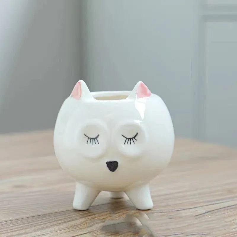 Ceramic succulent flowerpot with hand-painted cartoon animal design in pastel colours