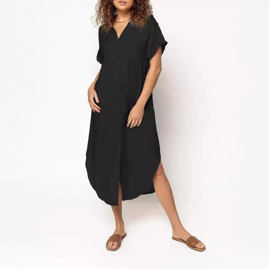 Loose fit casual midi dress with button front in solid colour on a model