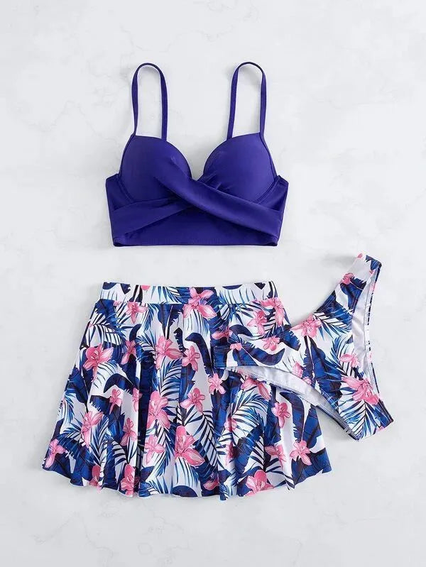 Women's three-piece high-waist bikini swimsuit in polyester fabric showing stomach coverage design