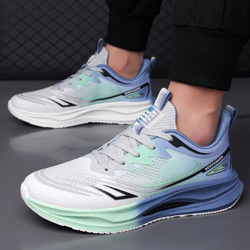 Men's Fly Woven Mesh casual shoes in grey and green, showing low-top design and rubber sole.