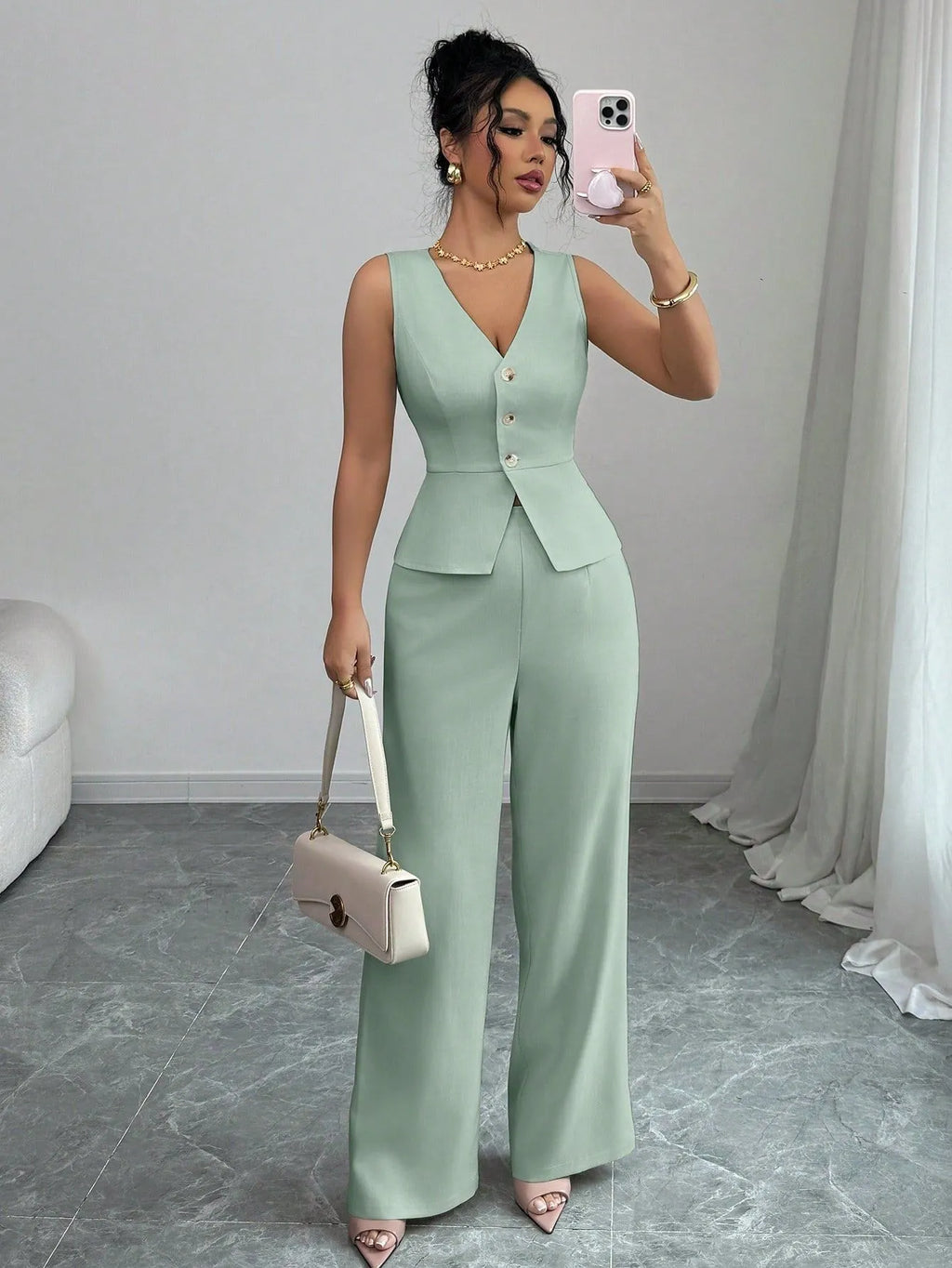 Women's black sleeveless vest and high waist trousers two-piece set on hanger