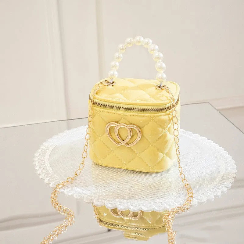 Women's heart-patterned PVC bucket gel bag in apricot colour with bucket shape