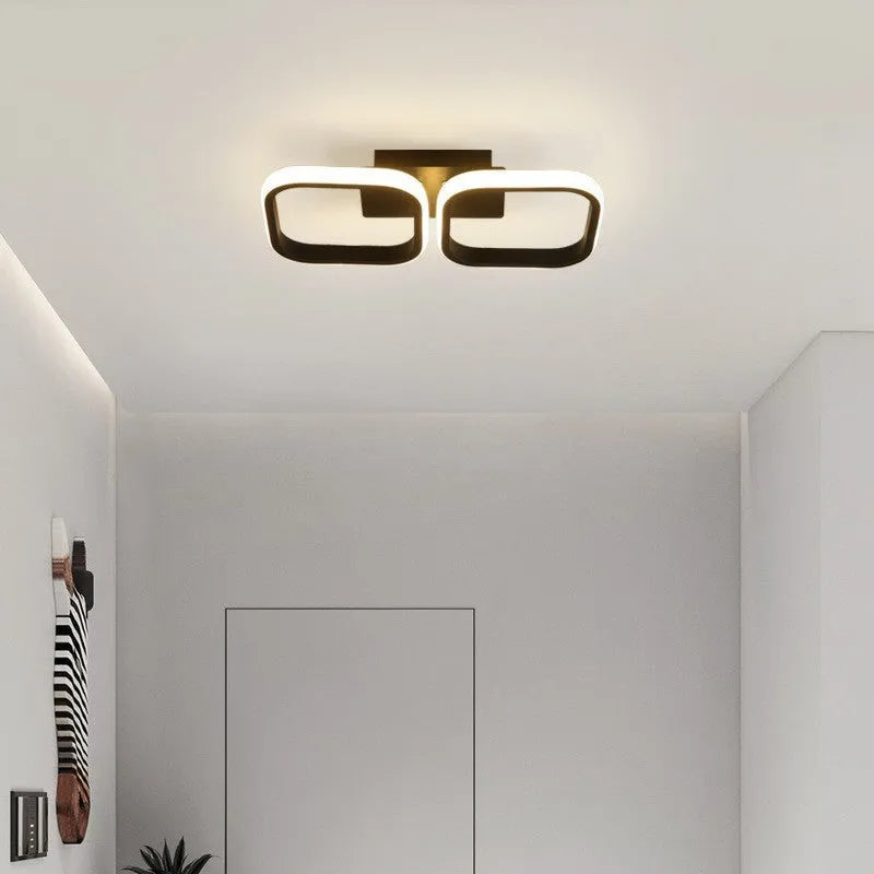 Modern LED ceiling light for hallway corridor with black round shape and white light