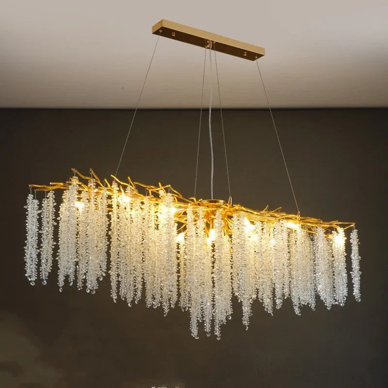Modern crystal chandelier light fitting with adjustable height in round and long style options.