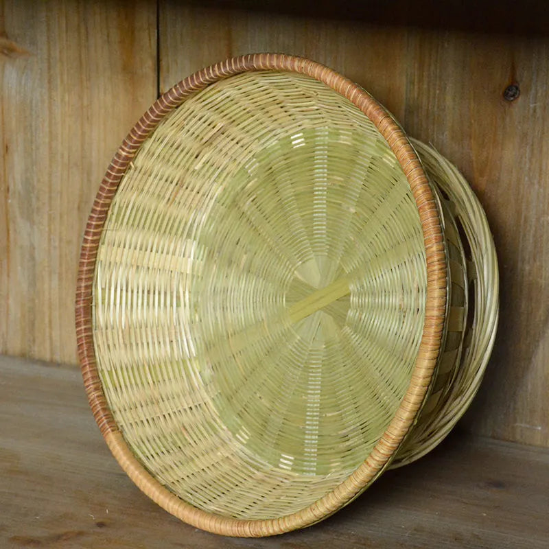 Handmade woven bamboo storage basket in three sizes for household organisation