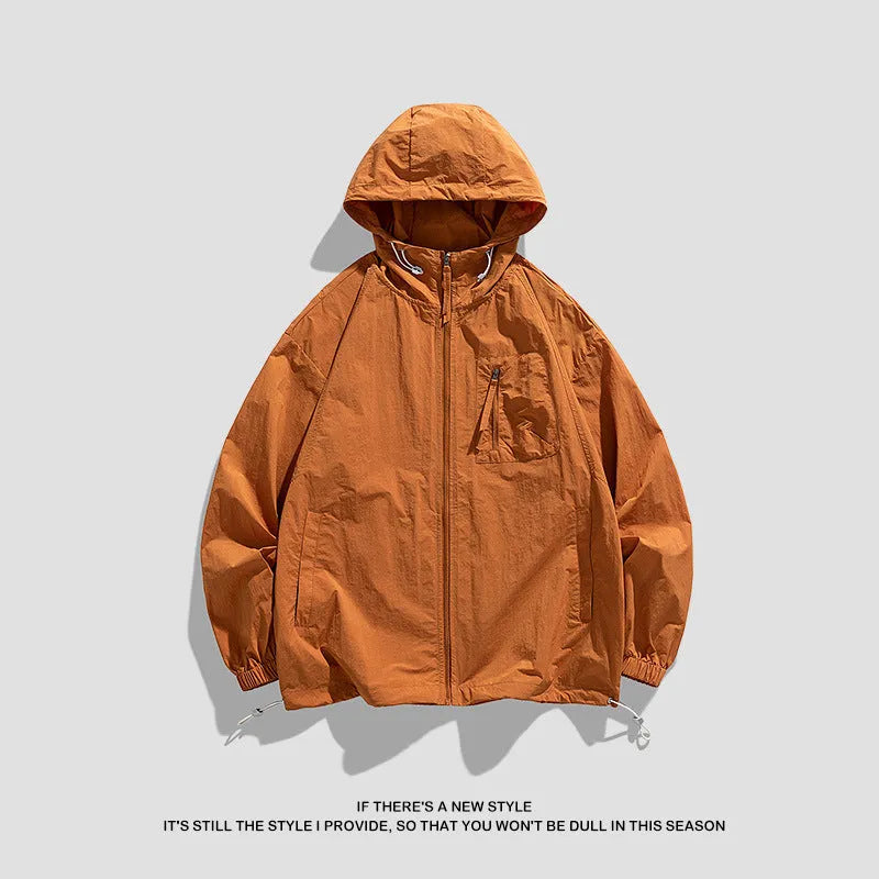 Lycra hooded sun protection jacket in light army green colour on a hanger