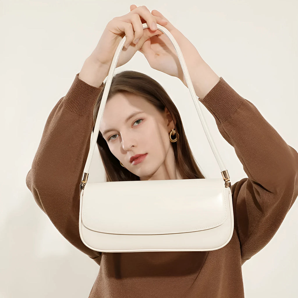 Genuine leather women's saddle bag in caramel, horizontal square shape with double shoulder straps