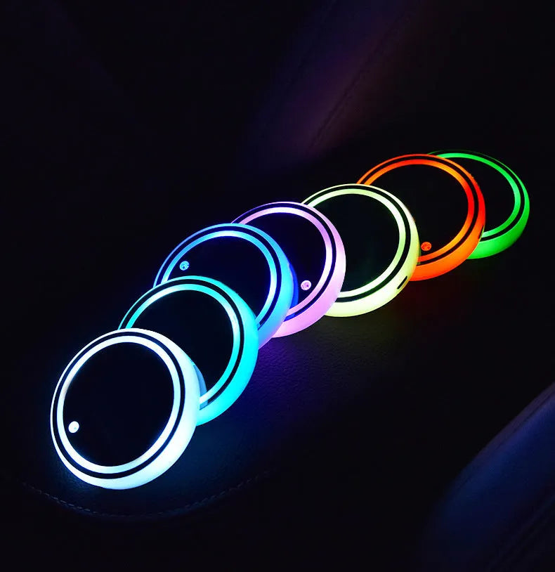 Colourful LED light-up car cup holder coaster showing seven colours, USB cable, and 68mm diameter non-slip surface.