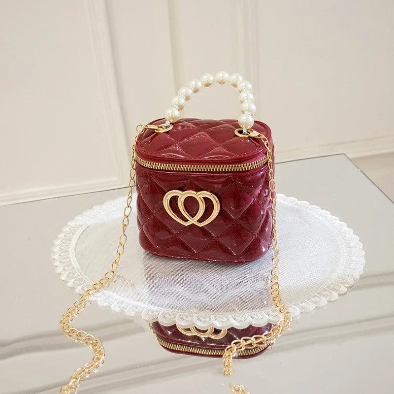 Women's heart-patterned PVC bucket gel bag in apricot colour with bucket shape