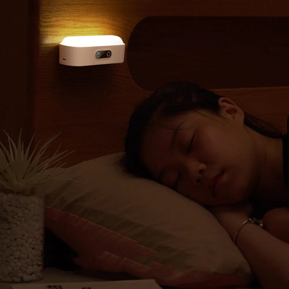 White magnetic USB rechargeable LED night light with touch buttons for dimming and colour temperature adjustment