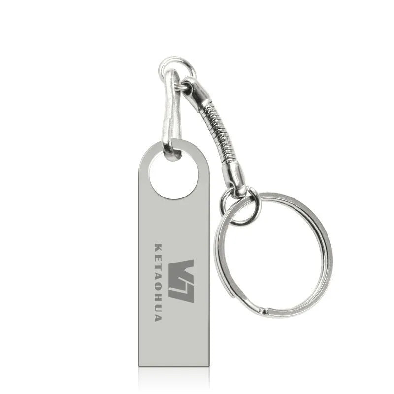Metal car-shaped USB flash drive in silver colour showing compact dimensions
