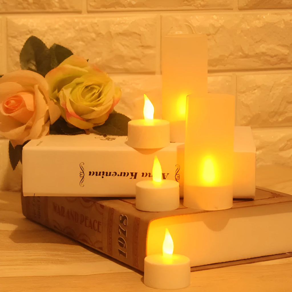 White plastic USB rechargeable LED candle lamp with yellow flashing flame effect on plastic cup