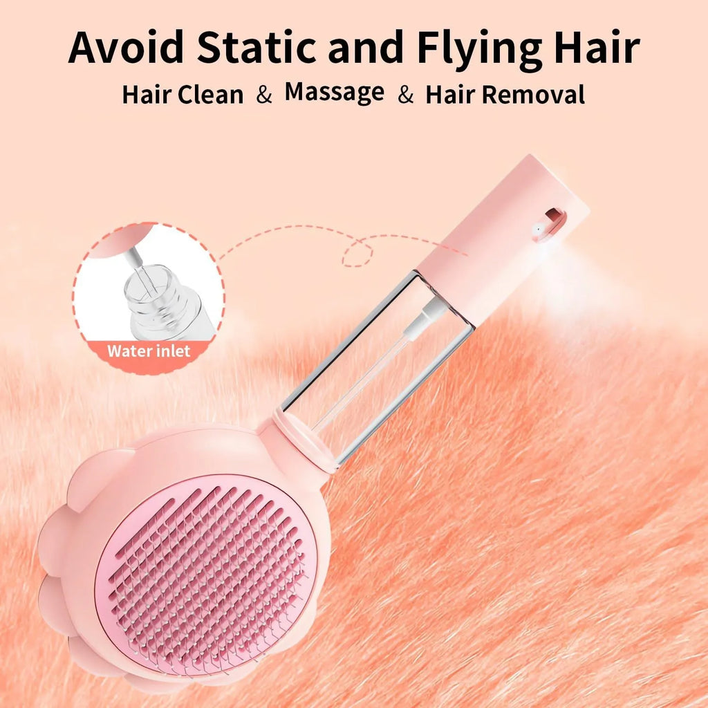 Grey spray cat brush with release button for grooming dogs and cats.