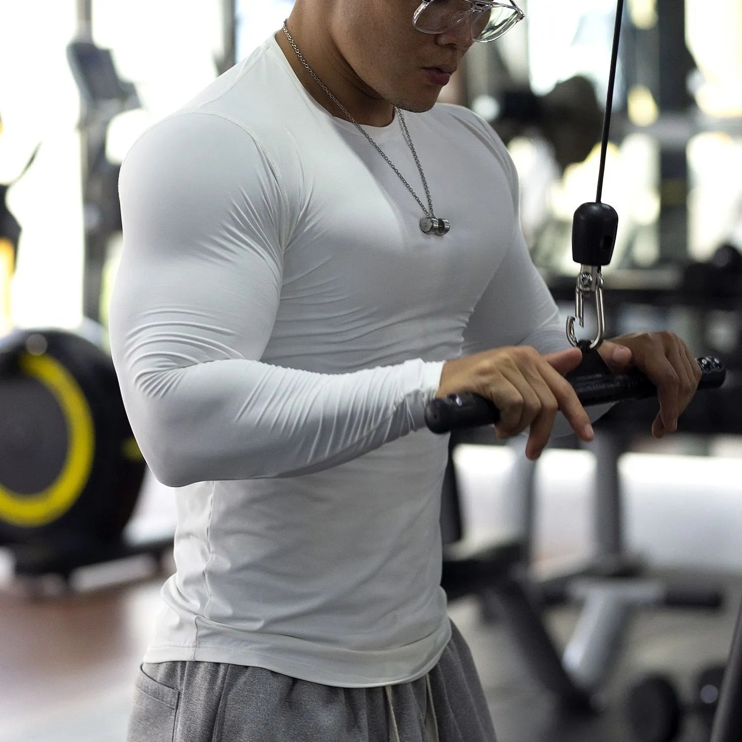 Men's black long sleeve slim fit fitness tights for running and gym workouts