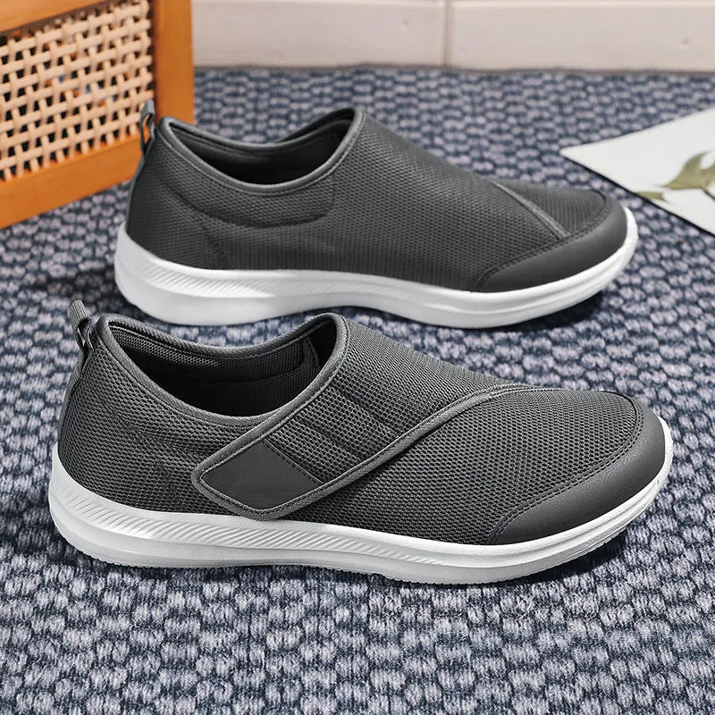Summer walking shoes with mesh upper and Velcro closure in black, grey, blue, or wine red.