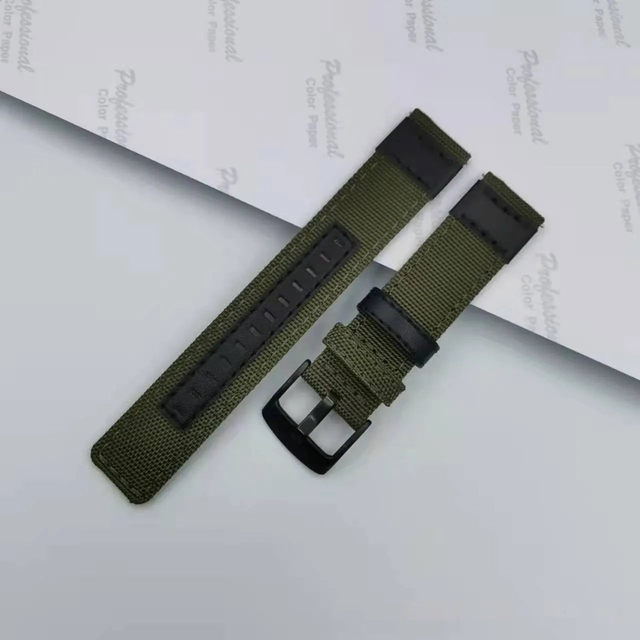 Oxford cloth canvas watch strap shown in Army Green colour, demonstrating its textured fabric and buckle.