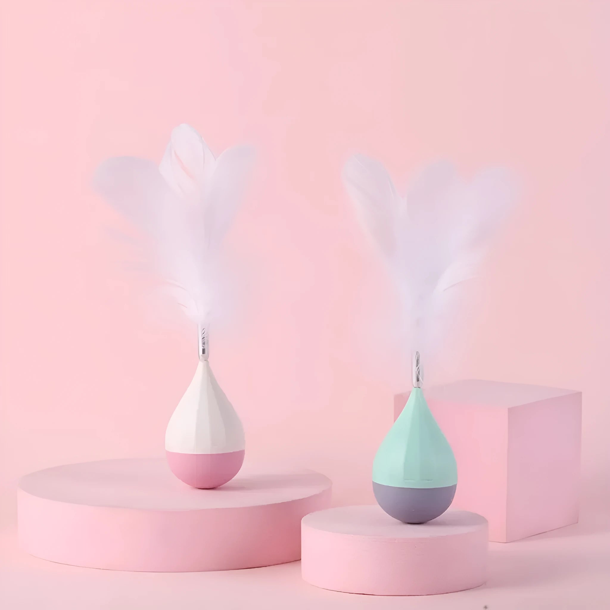 Green and pink feather tumbler cat toy with bite-resistant tease stick and goose feathers