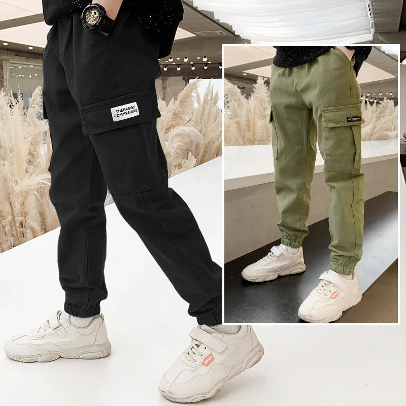 Boys' casual cotton summer trousers in khaki colour with elasticated waist, shown on size chart.