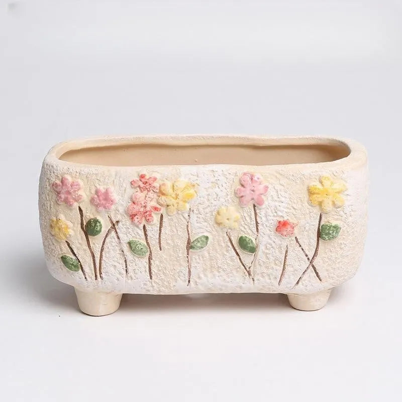 Rectangular hand-painted ceramic succulent flower pot showing floral design