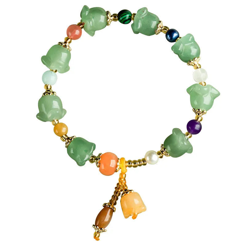 Women's natural jade orchid bracelet with carved beads for 14-18cm wrist.
