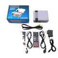 Compact black NES retro game console with two red controllers on a table