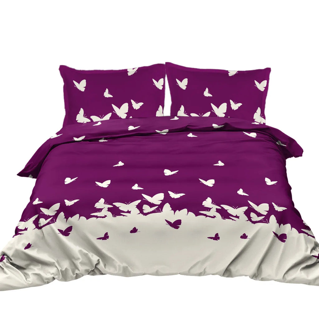 Purple butterfly 3-piece microfiber comforter set with reversible design on a bed